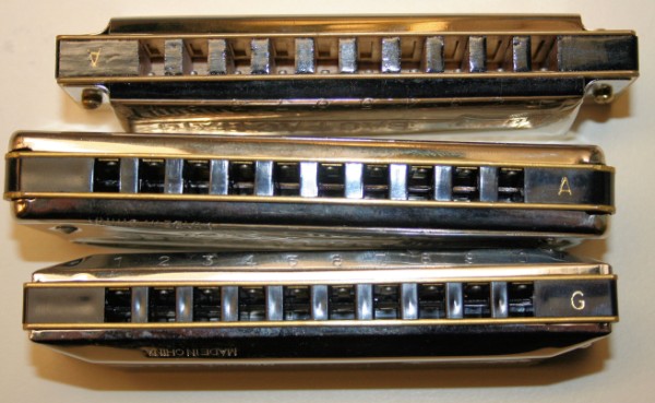 Huang harmonicas front: from bottom Silvertone, Star Performer, Bac Pac.