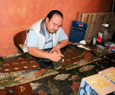 Hand painting labels at Don Valente