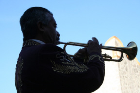 Mariachi musician playing at Partida